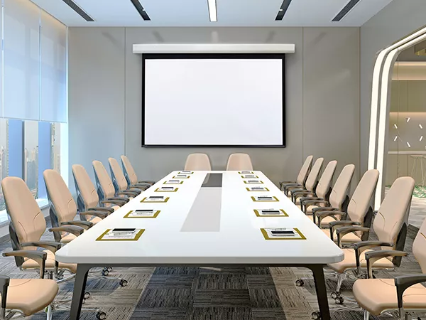 Acumen E screen in a corporate board room.