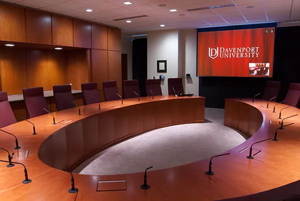 Access E projection screen in a boardroom at Davenport University. Photo by Don Kreski for Crestron Electronics.