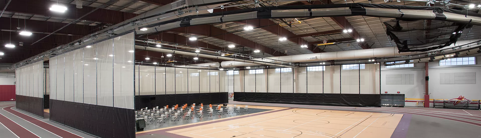 Gymnasium Dividers, Basketball Backstops, Practice Cages, Wall Pads, and Smart Gym Control System at Alvernia University.
