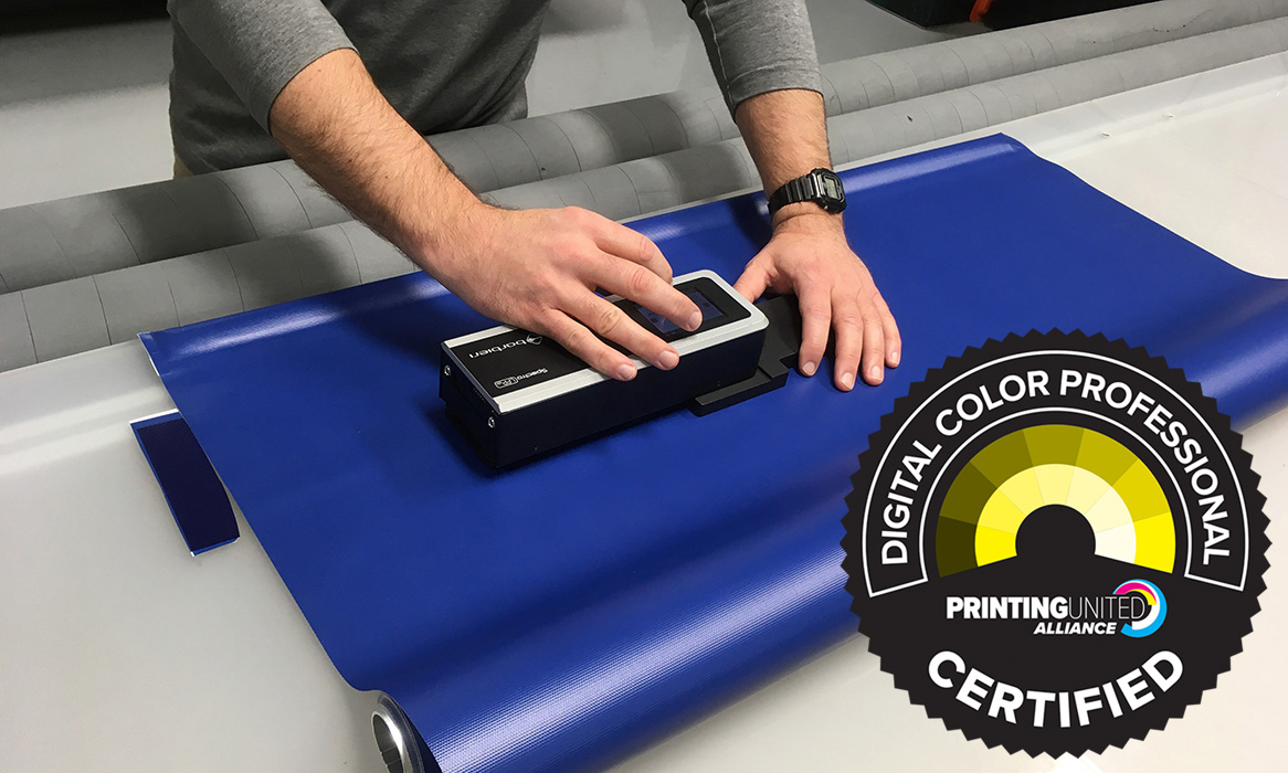 Certified Digital Color Professionals performing color matching with spectrophotometers.